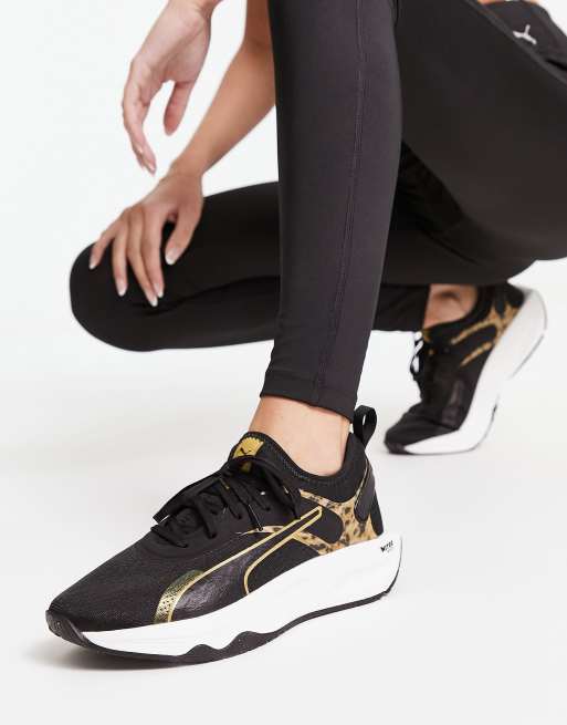 Puma Training PWR XX Nitro Safari Glam trainers in black and leopard print