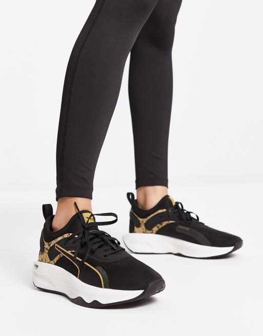 Puma Training PWR XX Nitro Safari Glam trainers in black and leopard print