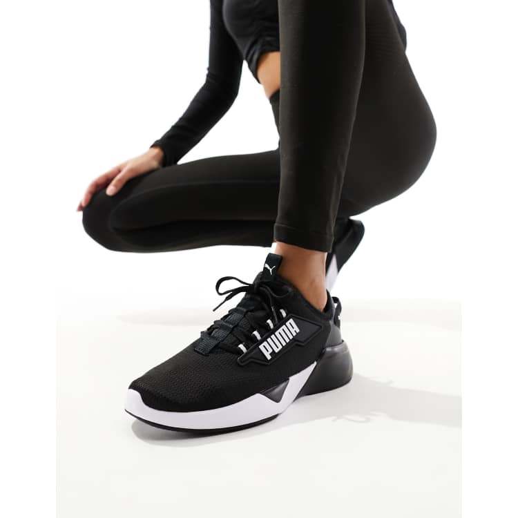 Puma Training Retaliate 2 trainers in black and white ASOS