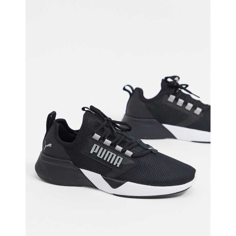 Puma training retaliate store trainers in black