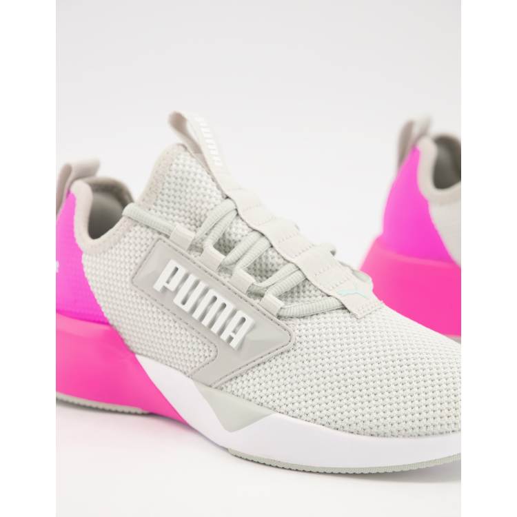 Pink and store gray pumas