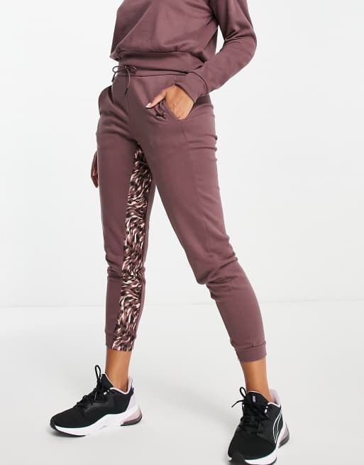 Puma Training Safari Glam trackies with leopard insert in purple