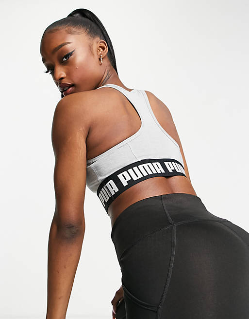 PUMA Training Strong mid support sports bra in gray | ASOS