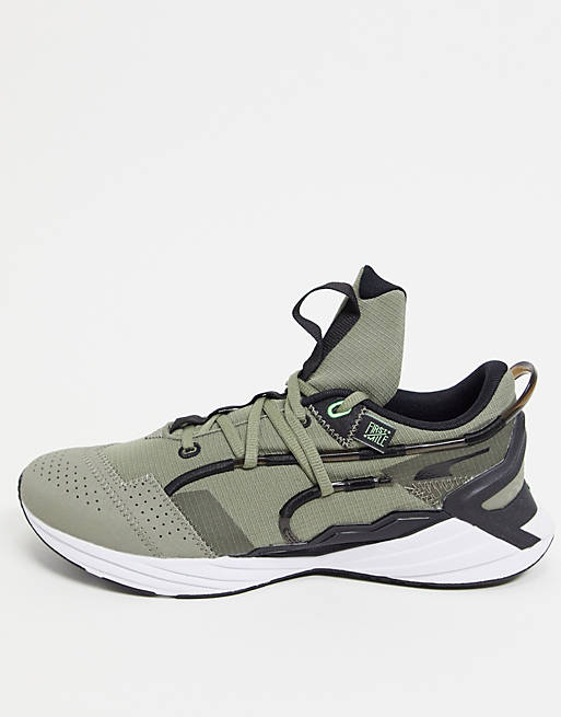 Puma Training Ultratriller trainers in green and black