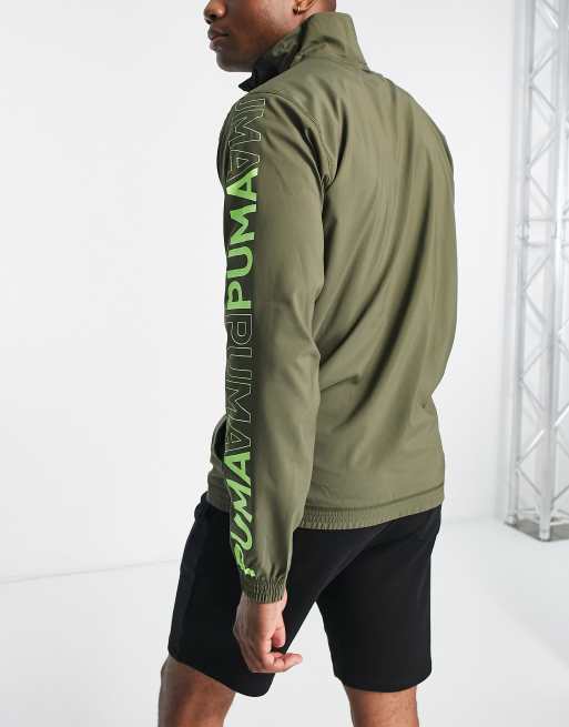 Puma Training woven 1/2 zip sweatshirt in khaki and black | ASOS