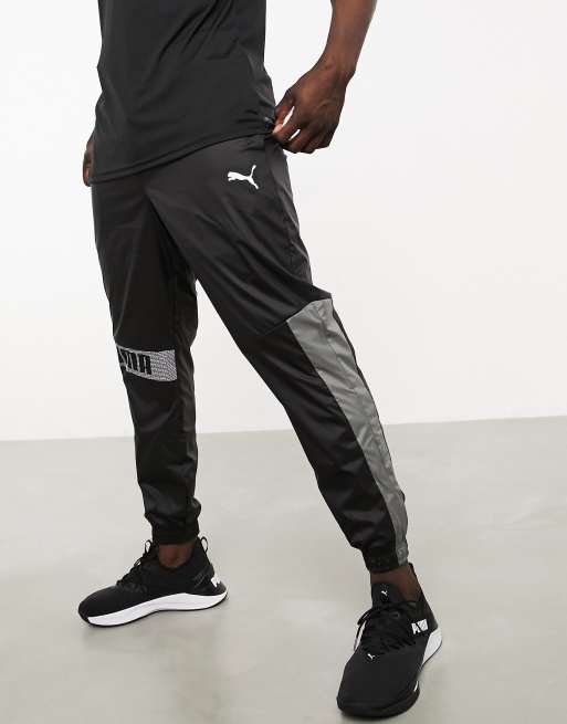 Puma Training woven joggers in black | ASOS