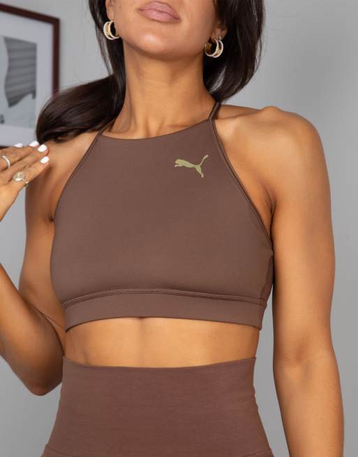 Puma - Training x Stef Fit logo light support sports bra in cream exclusive  to ASOS-Brown