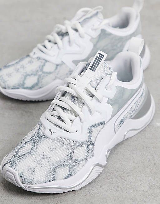 Couple Renaissance Feud Puma Training Zone XT Untamed sneakers in white | ASOS