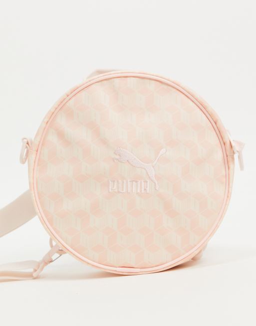 Puma unisex op round backpack in pink and white ASOS