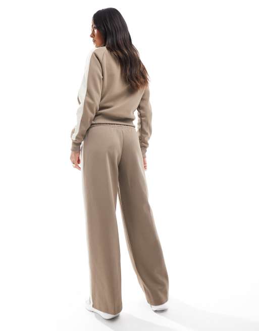 Puma unisex T7 low rise track pants in totally taupe | ASOS