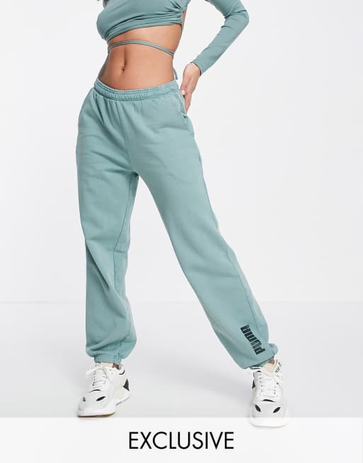 Puma unisex trackies in washed green Exclusive to ASOS