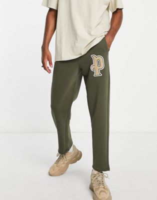 Puma Varsity Logo Sweatpants In Green | ModeSens