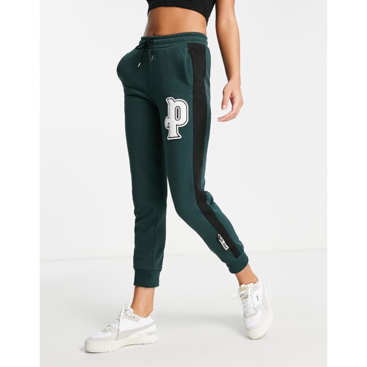 Puma varsity sweatpants in dark green ASOS