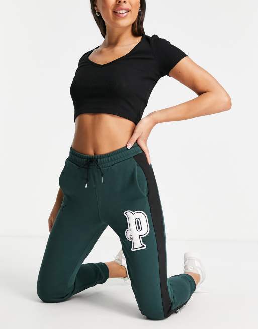 Puma varsity trackies in dark green