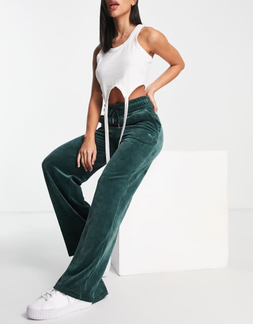 Puma velour wide leg joggers in dark green