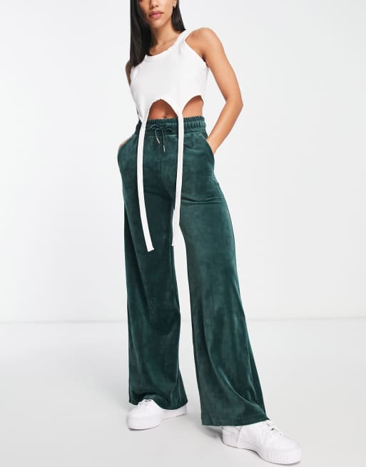 Puma velour wide leg joggers in dark green