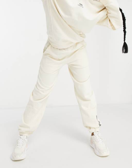 Puma washed track pants in off white exclusive to ASOS WHITE WHITE WHITE ASOS