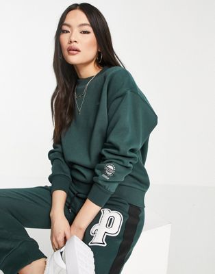 Puma Wellness Club sweatshirt in dark green