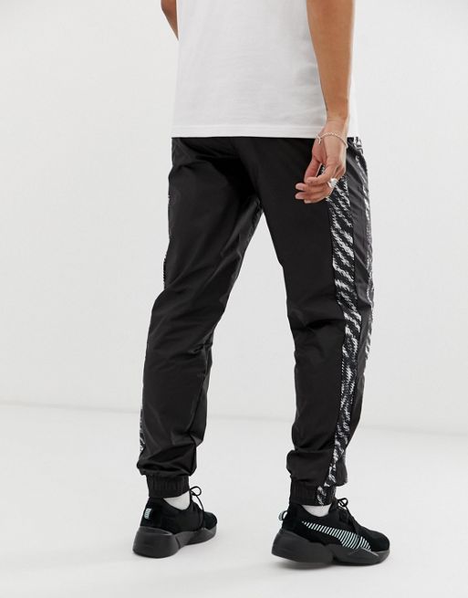 zebra-print track pants, Nike