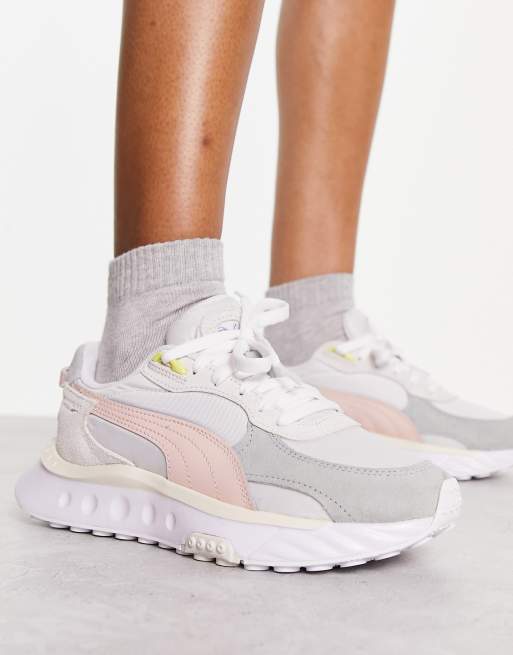 PUMA Wild Rider Rollin chunky sneakers in white with light pink