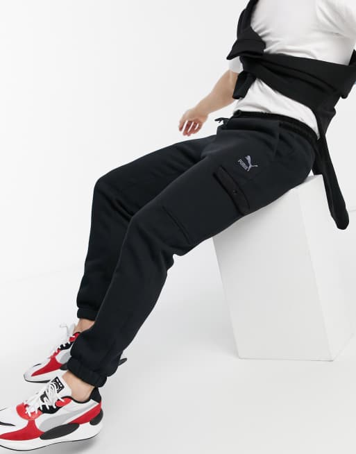 PUMA winter track pants in black ASOS