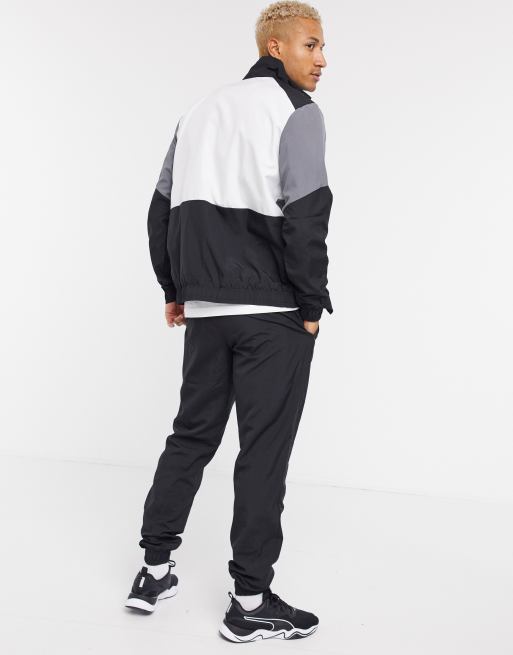 Puma woven best sale tracksuit mens