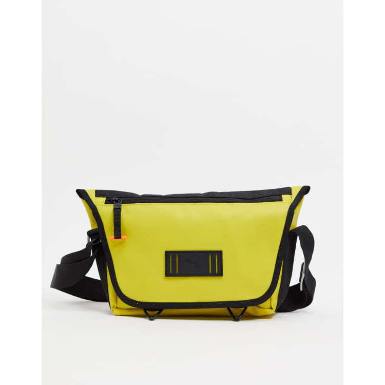 Puma x Central Saint Martins logo messenger bag in yellow