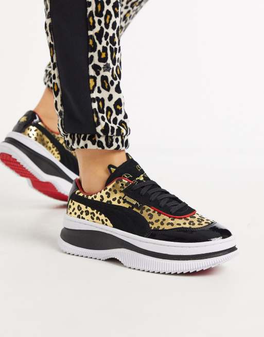 Charlotte olympia 2024 leopard sneakers