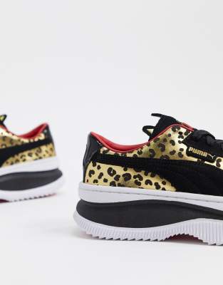 puma scarpe nere con suola marrone