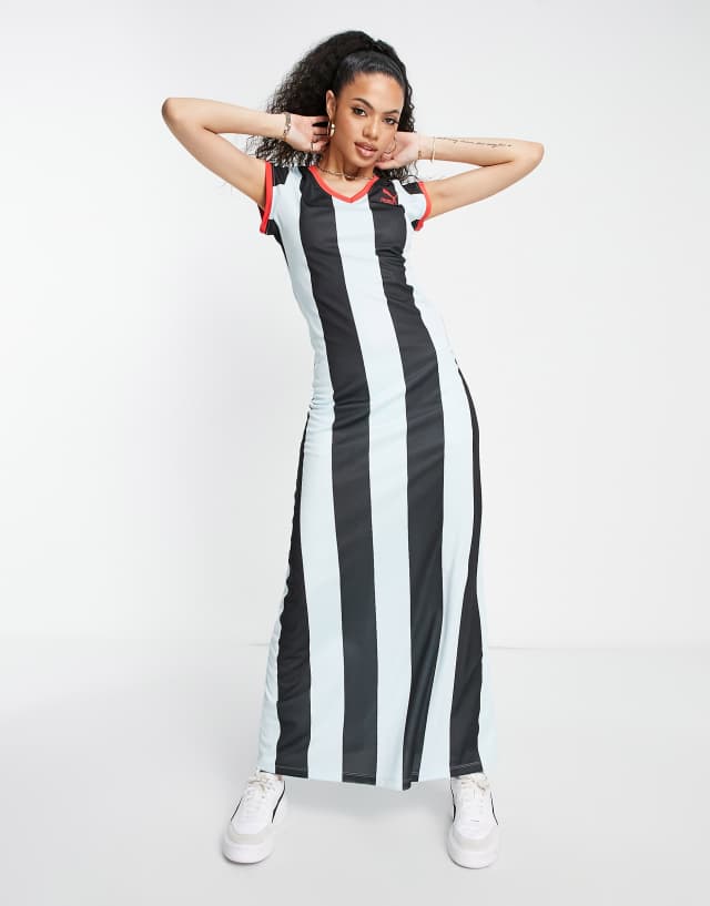 Puma x Dua Lipa dress in blue and black stripe