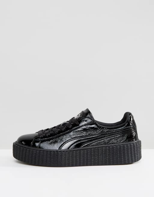 Puma creepers nere e clearance bianche