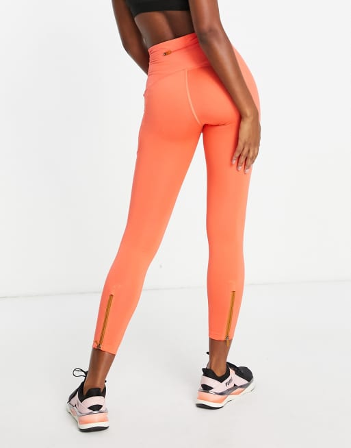 Puma x Helly Hansen Running leggings in coral and tan ASOS