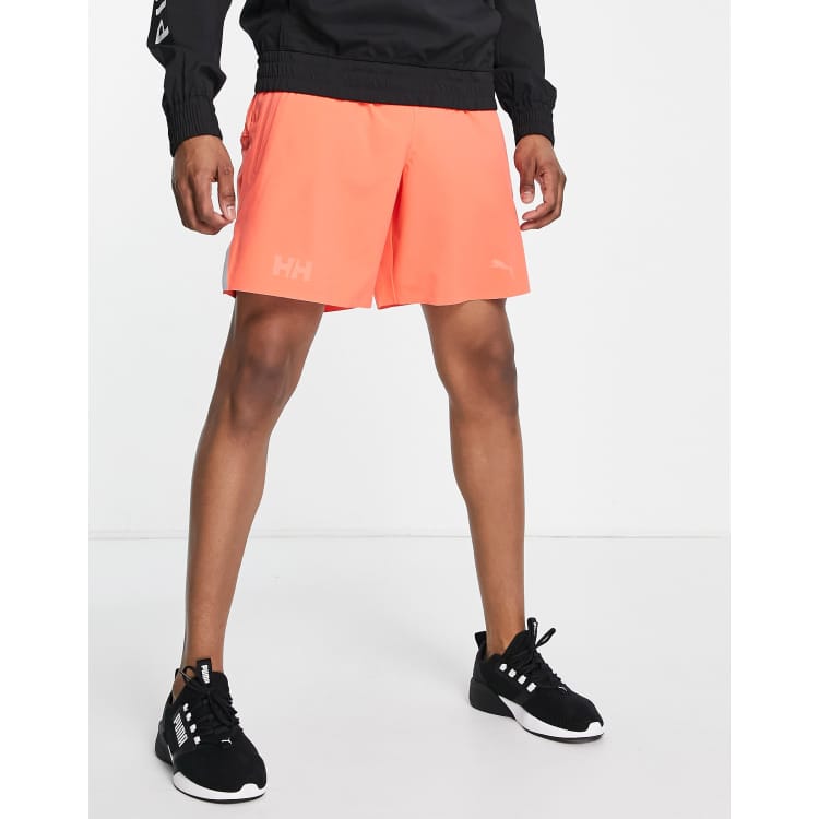 Puma x Helly Hansen Running shorts in hot coral ASOS
