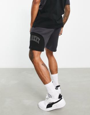 puma track shorts gold