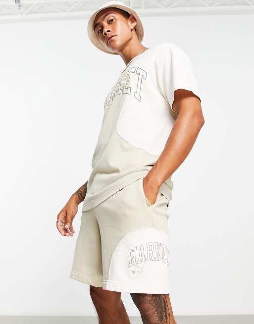 Puma x MARKET Regular 8 inch shorts in off white