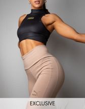 Puma Training Evoknit seamless light support sports bra in mocha bisque