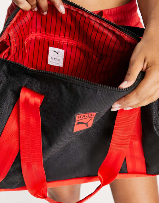 PUMA x VOGUE Duffle Bag in black | ASOS