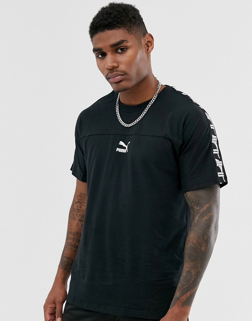 Puma – XTG – Svart t-shirt med tejpade detaljer och boxig passform