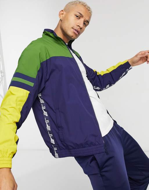 multifunctioneel Makkelijker maken winnaar PUMA XTG track jacket in navy and green | ASOS