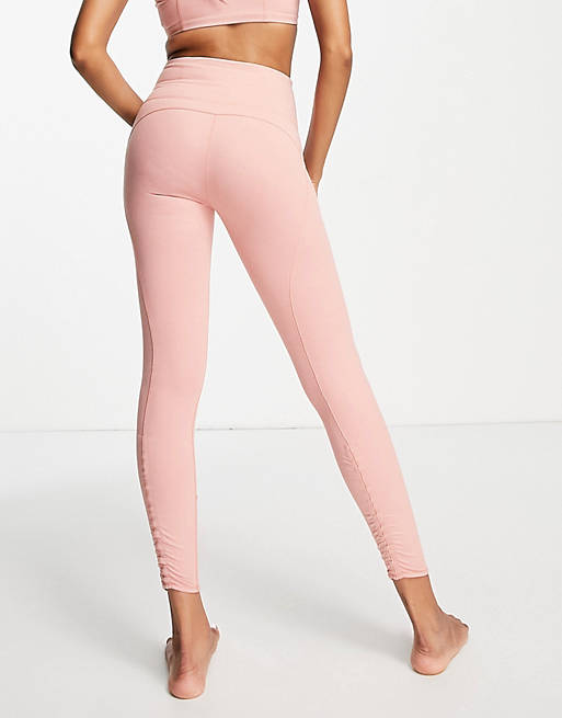 PUMA Yoga Studio Foundation 7/8 leggings in pink | ASOS