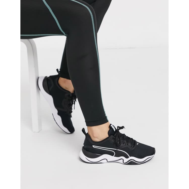 Puma Zone XT sneakers in black ASOS