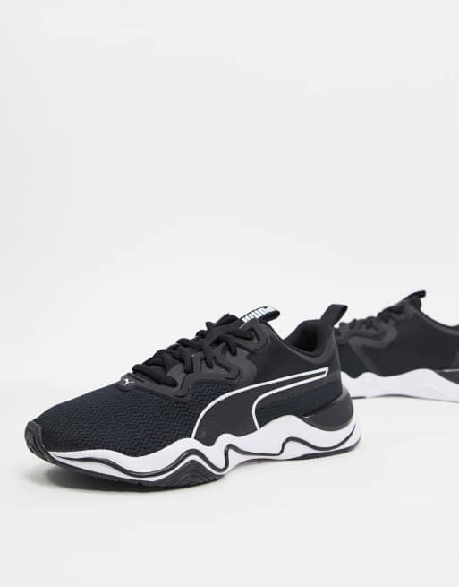 Puma Zone XT sneakers in black ASOS