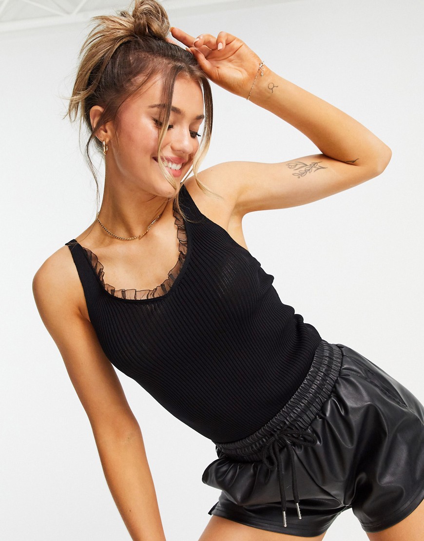 QED London knitted tank with frill trim in black