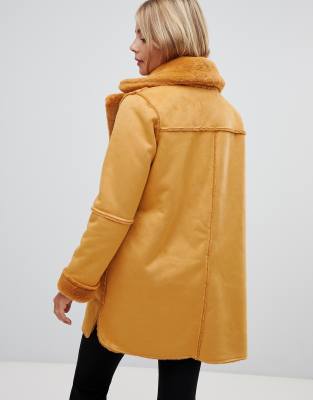 reversible faux shearling coat