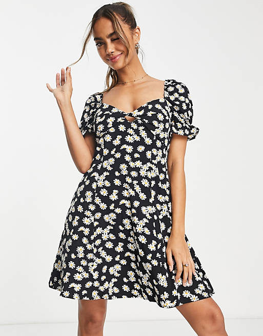 QED London twist front mini dress in daisy print | ASOS