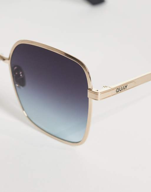 Quay 5th ave 70s large square metal frame sunglasses in gold with blue lens , 2 of 3
