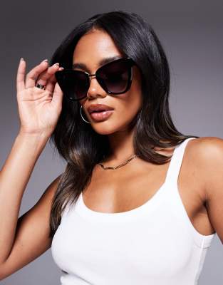 Quay - All Talk - Große Cat-Eye-Sonnenbrille in Schwarz und Goldoptik