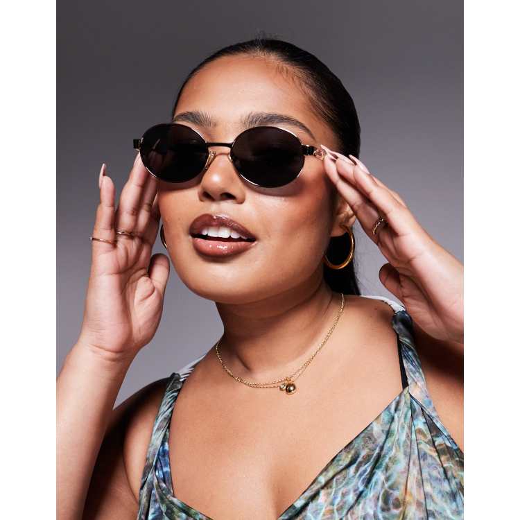 Quay anyways slim round metal sunglasses in gold with black  display picture 1