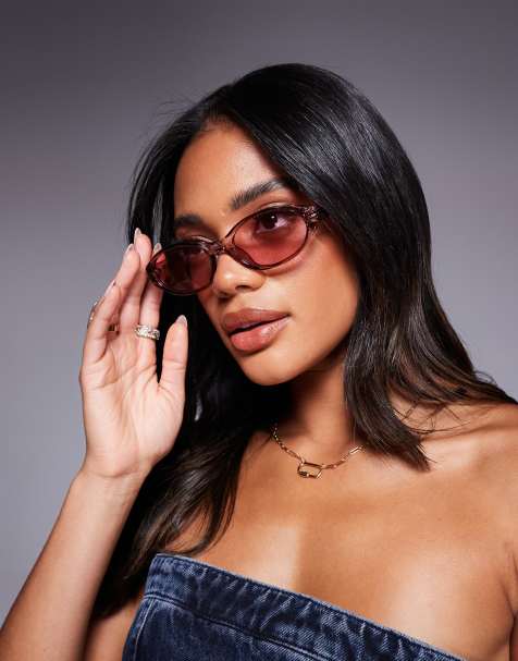 Quay aura points slim oval sunglasses in clear pink - view 1