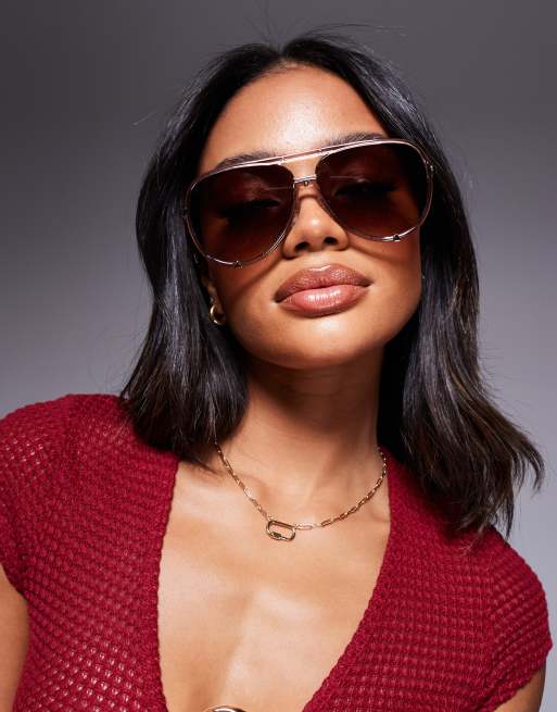 Quay High Profile in clear pink with brown lens 